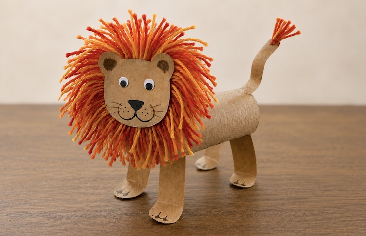 How to make a recycled toilet paper roll lion craft with a yarn mane.
