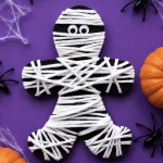 How to make yarn mummies with a full step by step tutorial and free printable. This easy Halloween craft is ideal for kids of all ages and is cheap and simple to make with recycled materials.