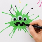 Fun and easy monster art craft idea for kids using straws and paint.