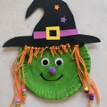 Easy paper plate crafts for kids to make. How to make a wicked green witch with a hat and yarn hair!