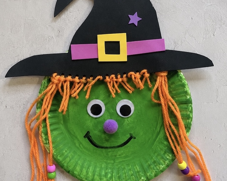 Easy paper plate crafts for kids to make. How to make a wicked green witch with a hat and yarn hair!