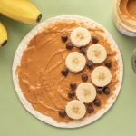 How to make a fun snack, breakfast or quick lunch for kids with tortillas, peanut butter, banana, and chocolate chips. A fun sweet twist on quesadillas!