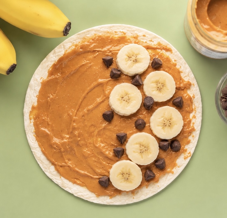 How to make a fun snack, breakfast or quick lunch for kids with tortillas, peanut butter, banana, and chocolate chips. A fun sweet twist on quesadillas!