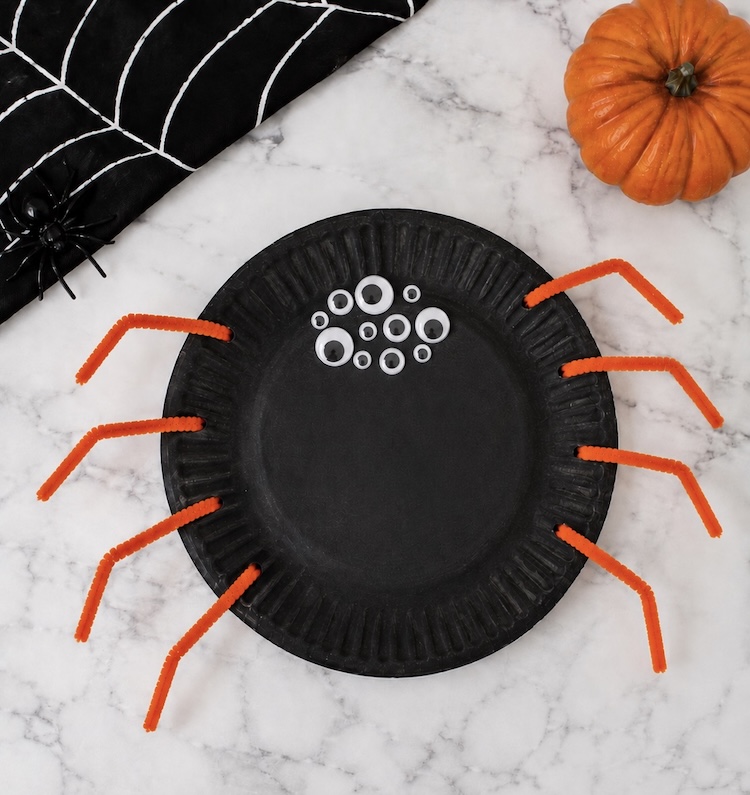 How to make a paper plate spider with pipe cleaner legs for Halloween. 