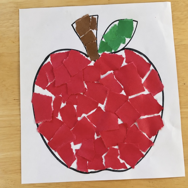 Easy preschool art idea using torn paper. How to make a construction paper apple with a free template to print.