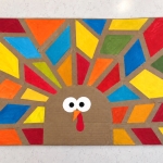 How to make tape resistant turkey art! A fun, easy, and budget friendly fall craft for kids of all ages using cardboard and painter's tape.