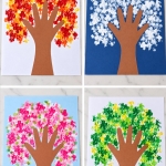 Easy construction paper tree art kids craft using q-tips as paint brushes and a traced hand as the tree trunk. This simple low mess craft is made with cheap supplies and is fun for kids of all ages.