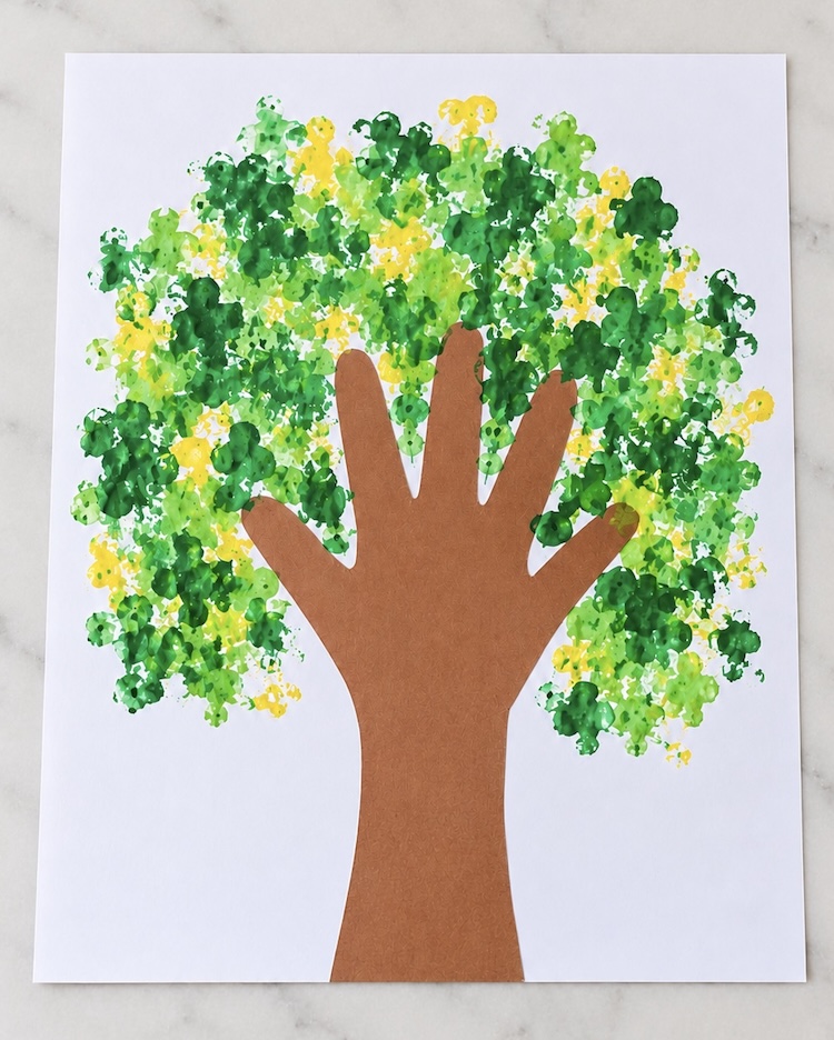 Simple tree art idea using a handprint for the tree trunk and branches.