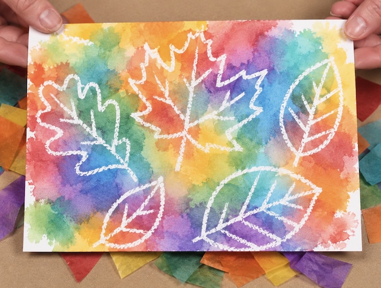Easy color transfer tissue paper art project using a white crayon and spray bottle.