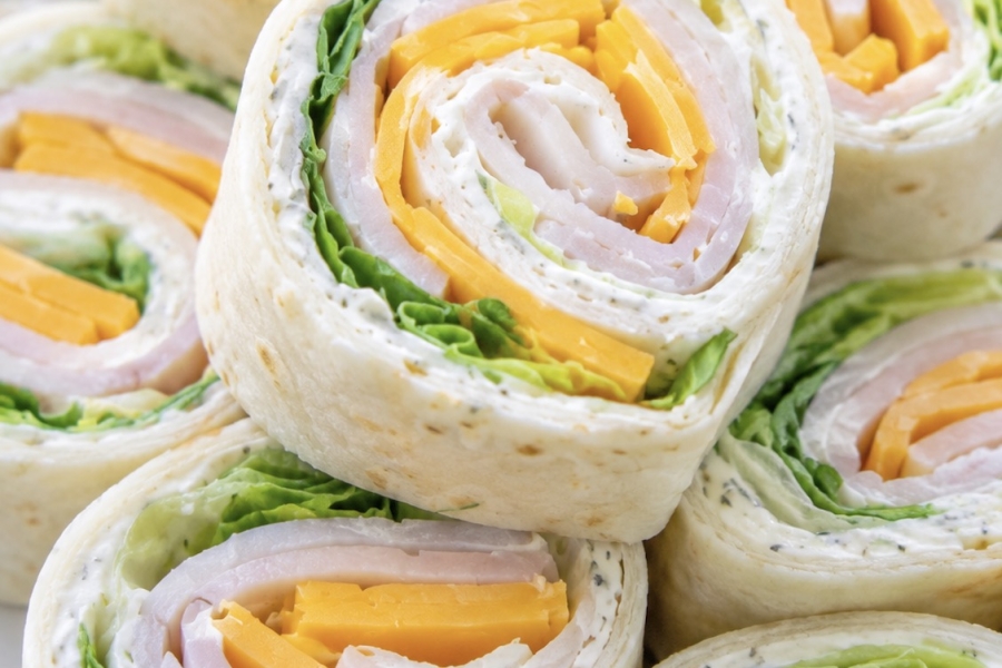 How to make turkey cheese rollups with flavored cream cheese spread for a quick cold lunch for school, work, or at home when you need something fast to make for picky eaters.