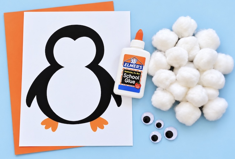 Craft supplies for making easy cotton ball penguins including printer paper, a free printable, orange construction paper, cotton balls, glue, and googly eyes.
