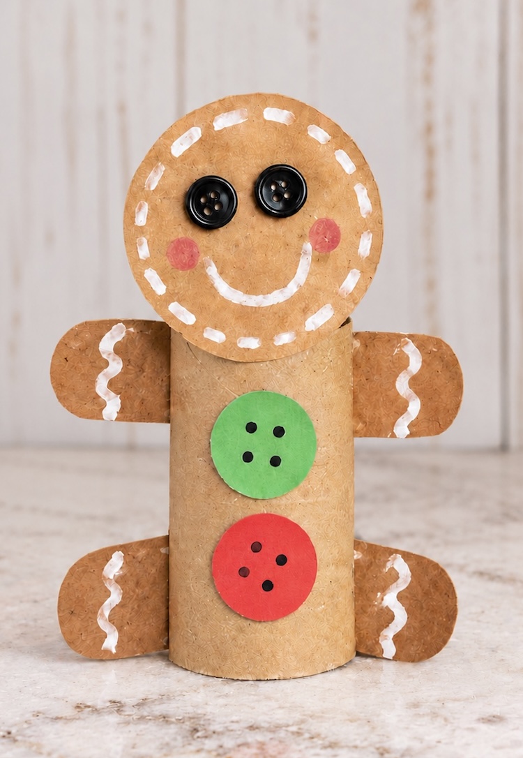 Step by step craft tutorial for making toilet paper roll gingerbread men for Christmas! This easy kids craft is cheap to make using recycled materials and turns out really cute for displaying over the holidays. Make it at home or in the classroom!