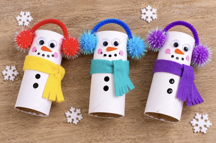 How to make a cute snowman craft for Christmas using toilet paper rolls and white paint.