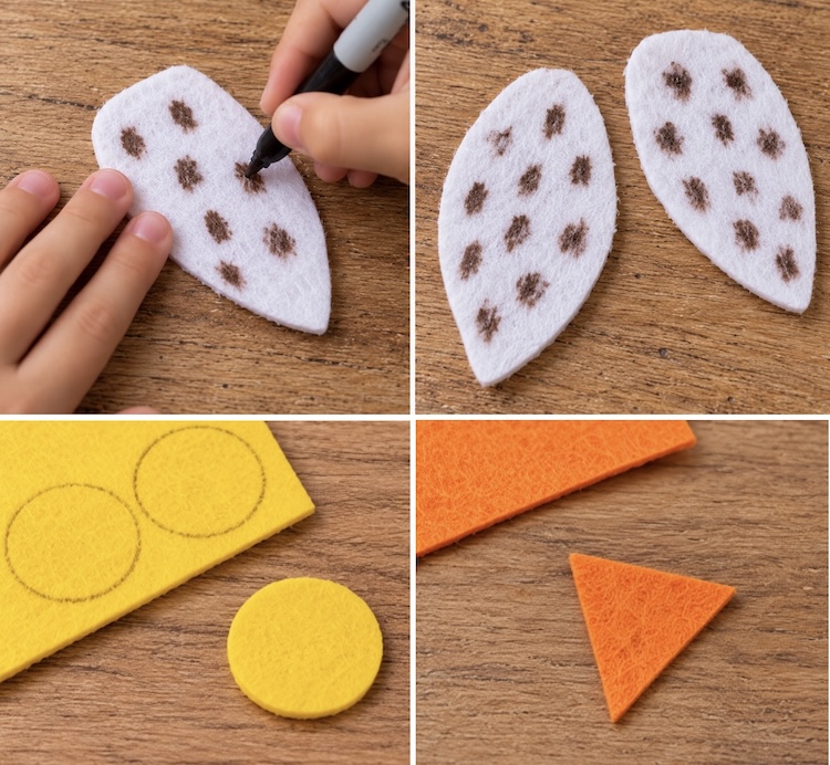 Cutting felt to make the beak, eyes, and wings of a pinecone owl craft. 