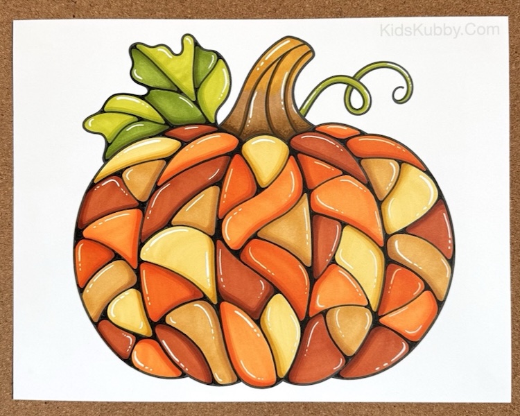 Mosaic style pumpkin coloring page colored with markers to look like stained glass. DIY step by step art project.