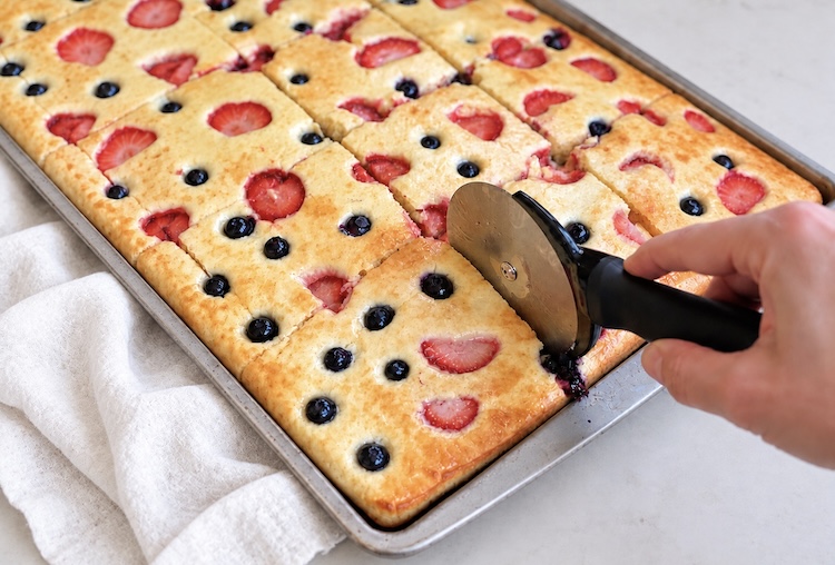 How to make easy pancakes in the oven for a crowd with pancake mix. I used Biscquick and it made fluffy pancakes my kids loved.