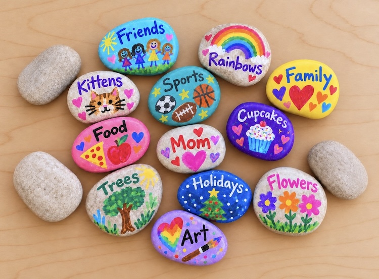 Easy thanksgiving gratitude activity for kids. Painting rocks with things they are thankful for using acrylic paint markers.